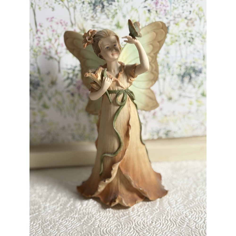 Whimsical Fairy Figurine with Butterfly